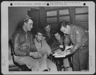 Thumbnail for General > Flight Leaders Of The 38Th Fighter Squadron, Based At Nuthampstead, England, Gather For An Informal Briefing By Major Milton Joel Of Richmond, Virginia, Just Before A Mission Over Enemy Territory.  They Are, Left To Right:  1Lt James Hancock Of Sebring, F