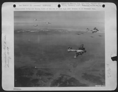 Thumbnail for Boeing > Consolidated B-24S And Boeing B-17S Of The 8Th Af Meet High Over Germany On 25 February 1945.