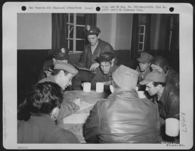 Thumbnail for General > Bomber Crews Being Interrogated Upon Their Return To An Airbase In England From The First Consolidated B-24 "Flying Fortress" Raid Made On Hamburg, Germany.  27 July 1943.