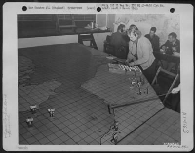 Thumbnail for General > Pfc. Lola G. Mccoy Of Renselver, Ind., Is Shown At Work On A Plotting Board In The Operations Room At A 9Th Bomber Command Base Near Colchester, England.  19 November 1943.