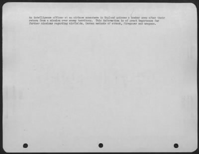 General > An Intelligence Officer At An Airbase Somewhere In England Quizzes A Bomber Crew After Their Return From A Mission Over Enemy Territory.  This Information Is Of Great Importance For Further Missions Regarding Airfields, German Methods Of Attack, Firepower