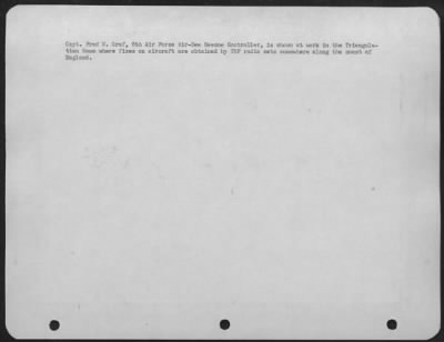General > Capt. Fred W. Graf, 8Th Air Force Air-Sea Rescue Controller, Is Shown At Work In The Triangulation Room Where Fixes On Aircraft Are Obtained By Vhf Radio Sets Somewhere Along The Coast Of England.