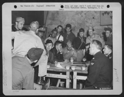 Thumbnail for General > Combat Crew Members Of The 458Th Bomb Group Who Have Just Returned From Bombing Raids Over Enemy Targets In Europe, Are Interrogated At Their 8Th Air Force Base In England.