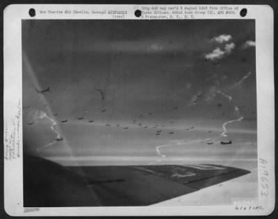 Thumbnail for Boeing > Formation Of Boeing B-17 Flying Fortresses Of The 452Nd Bomb Group Makes Its Bomb Run Over A Cloud Covered Berlin, Germany 9 March 1944.  Their Only Guide For Bomb Release Point Is A Streak Of White Smoke Left By The 'Marker' Bomb Which Has Been Dropped I