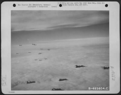 Thumbnail for Boeing > Flying High Above The Clouds, Boeing B-17 Flying Fortresses Of The 91St Bomb Group Wing Their Way To Bomb Enemy Installations In Frankfurt, Germany.  29 January 1944.