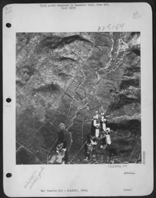 Thumbnail for Consolidated > Marauders Blast Foligno Marshalling Yards - This Bomb Strike Photo Shows Bombs From A B-26 Marauder Enroute To Another Axis Target In Italy, The Marshalling Yards At Foligno, Northeast Of Rome.  Other Bombs Are Seen Hitting Amoung The Tracks And Yards At