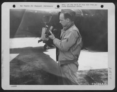 Thumbnail for Cameras,Gun > A Crew Member Of The 96Th Bomb Group Checks A Gun Camera Of A Republic P-47 At An 8Th Air Force Base In England.  6 July 1943.