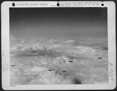 Consolidated > High Above Dense Carpet Of Clouds, Consolidated B-24 "Liberators" Head For Their Bomb Run Over Berlin, Germany, 22 March 1944.  Heavies Of The 8Th Air Force Are Striking Deeper And Deeper Into Nazi Territory Paralyzing Supply Lines And Vital Industries.