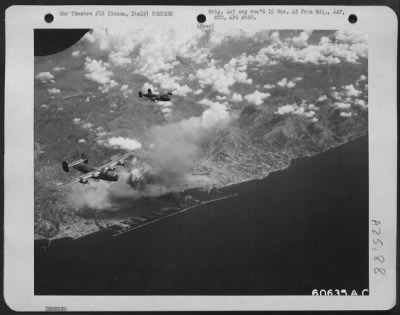 Thumbnail for Consolidated > A White Plume Of Smoke Rises High Over The Genoa Harbor Installations As Consolidated B-24 Liberator Bombers Of The 15Th Air Force Plaster It On 2 Aug. 1944.  A Possible Destroyer Was Hit, Also A Submarine And Two Merchant Vessels Received Near Misses.  M