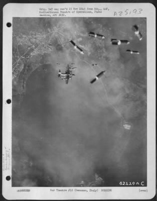 Consolidated > This Picture, Snapped On A Mission By Martin B-26 Marauders Against A German Troop Concentration West Of Velletri, Shows A Narrow Escape By One Of The Medium Bombers From The Explosives Of Its Own Formation.  The Near Accident Resulted When The Plane'S Pi