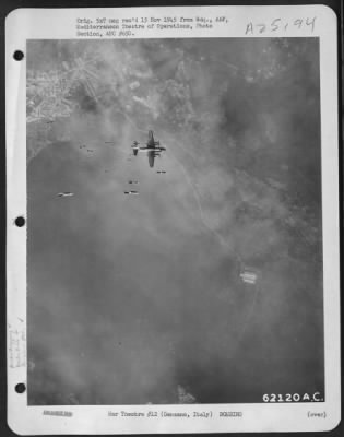 Thumbnail for Consolidated > This Picture, Snapped On A Mission By Martin B-26 Marauders Against A German Troop Concentration West Of Velletri, Shows A Narrow Escape By One Of The Medium Bombers From The Explosives Of Its Own Formation.  The Near Accident Resulted When The Plane'S Pi