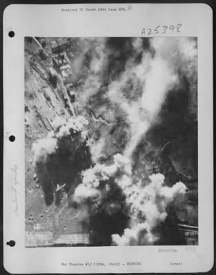 Thumbnail for Consolidated > Through The Smoke Of Bursting Bombs, You Can See The Rail Lines That Converged In The Yards At Orte, Junction For Railroads Running East-West And North-South Above Rome. B-26 Marauders Hit The Yards Six Days Before The Allied Landings South Of Rome; B-25