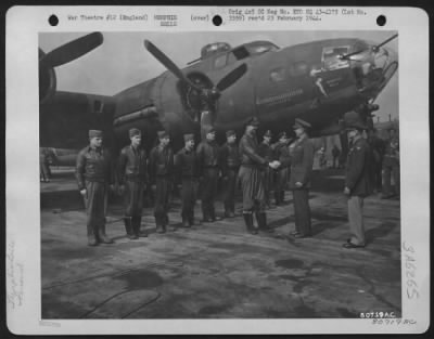 General > Lt. General Jacob L. Devers Bids Farewell To Capt. Robert K. Morgan Of Asheville, North Carolina And His Crew Of The Boeing B-17 'Memphis Belle' Just Before They Took Of For The Return Trip To The States After They Had Completed Their 25Th Operational Fli