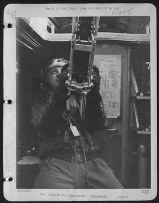 Thumbnail for General > St. Charles J. Eilchiondo, Medford Mass., Radio Operator Of The B-17 Invader Ii Manning A Gun.