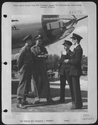 Thumbnail for General > Two 9Th Af Marauder Flying Officers Who Are Operating Their Medium Bombers On Night Bombing Missions, Receive Valuable Tips From Two Royal Australian Air Force Officers, Who Have Been Operating Mitchell Bombers On Night Missions From British Bases For A M