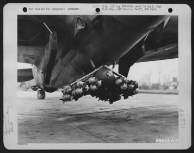 Thumbnail for General > Fragmentation Bombs Attached To The Belly Of A Republic P-47 Of The 353Rd Fighter Group, Before Taking Off From Its English Base On A Mission Over Enemy Installations.