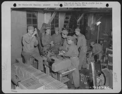 Thumbnail for General > These Airmen Are Using A Linking Machine To Clip 50 Cal. Cartridges In Lins For Use In Airplane Machine Guns At An 8Th Air Force Service Command Depot At Sharnbrook, England.  7 July 1943.