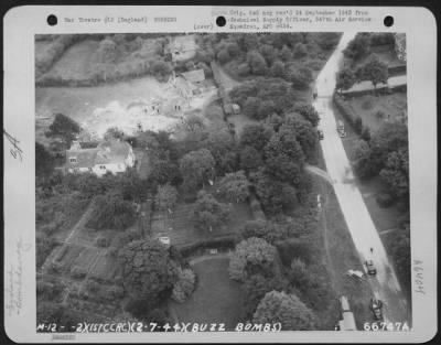 Bovingdon > Aerial View Of Houses Damaged By A Buzz Bomb Which Hit In The Residential Area In Bovingdon, England, On 2 July 1944.