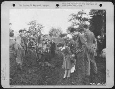 Thumbnail for Gosfield- V-2 > Interested Members Of The 410Th Bomb Group And English Civilians Look Over The Remanents Of A German Robot Bomb Which Exploded Near A 9Th Air Force Base In England.  9 July 1944.