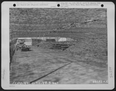 Thumbnail for General > Truck And Trailer Used To Haul Bombs From Thsi Camouflaged Bomb Dump To The Planes Of The 381St Bomb Group In England, 9 March 1944.