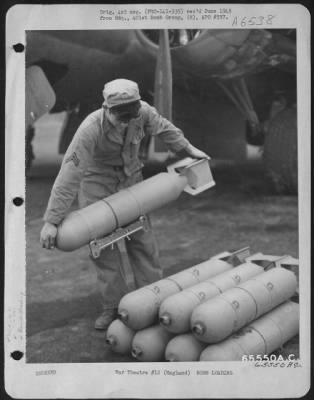 Thumbnail for General > A Corporal Assigned To The Armament Section Of The 612Th Bomb Squadron, 401St Bomb Group, Unloads Bombs Under The Fuselage Of A Boeing B-17 "Flying Fortress" England, 8 January 1944.