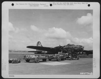 Thumbnail for General > A Loaded Bomb Trailer Is Parked Beside The Boeing B-17 "Flying Fortress" "Chennault'S Pappy" At The 91St Bomb Group Base In Basinbourne, England.  9 April 1944.