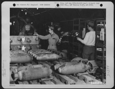 General > Inside A Quonset Hut At An 8Th Air Force Base In England, Ordnance Men Are Busy Loading Bombs Which Will Be Dropped On Enemy Installations In Europe By Planes Of The 353Rd Fighter Group.  April 1944.