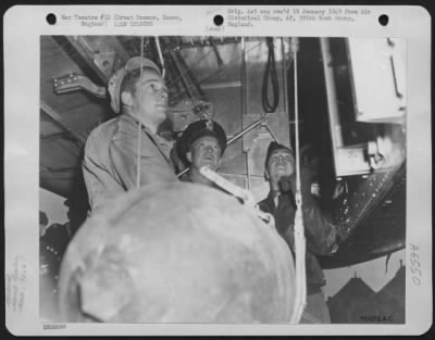 Thumbnail for General > General Dwight D. Eisenhower Looks On As An Armorer Loads Bombs On A Martin B-26 "Marauder" Of The 386Th Bomb Group At Great Dunmow, Essex, England On 11 April 1944.