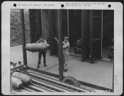 Thumbnail for General > Five Hundred Pound Bombs Are Hoisted Onto A Trailer Before Loading On Planes Of The 364Th Fighter Group, 67Th Fighter Wing At 8Th Air Force Station F-375, Honnington, England.  4 September 1944.