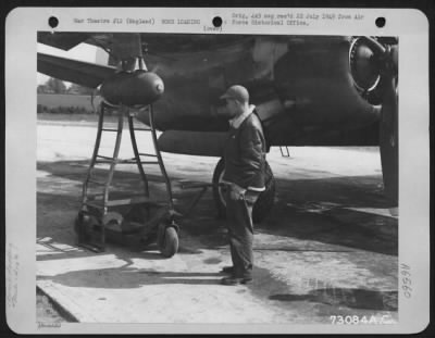 Thumbnail for General > A Member Of The 410Th Bomb Group, Lifts A Bomb To The Wing Rack With The Use Of A Wing Bomb Cradle.  9Th Air Force Base In England, 22 May 1944.