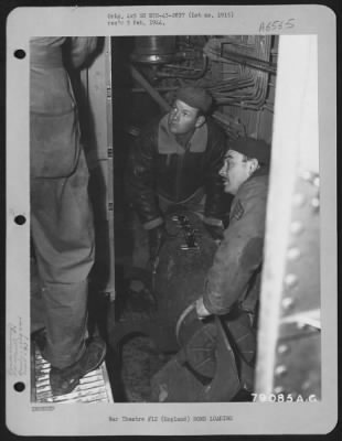 Thumbnail for General > Cpl. John C. Brackette, Salecreek, Tenn., (Left) And Sgt. Van L. Gray, Nashville, Tenn., Move A 1,000 Lb Bomb Into Position To Be Hoisted Into The Bomb Racks Of A Consolidated B-24 Liberator Which Is Being Prepared For Another Mission Over Enemy Territory