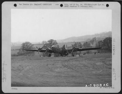 General > After Three Engines Had Been Shot Out Of Commission Over France, This Boeing B-17 "Flying Fortress" Returned, But Had To Make An Emergency Landing And Undergo Repairs On The Spot.  Here, It Is Shown At Dawlish, England, Awaiting The Building Of An Emergen