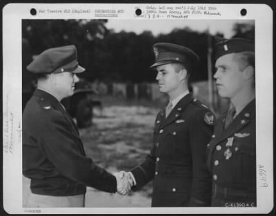 Thumbnail for Awards > Colonel Archie J. Old, Jr., Of Atlanta, Texas, Congratulates Capt. James J. Cocherill, Muscatine, Iowa, Upon Receiving The Distinguished Flying Cross.  563Rd Bomb Group, 388Th Bomb Group.  25 July 1944.