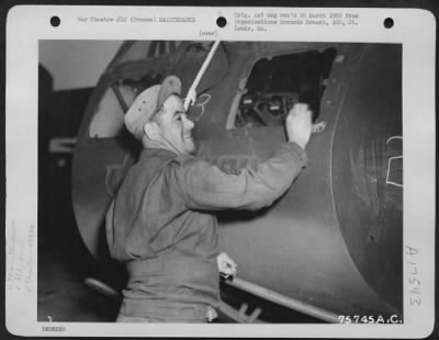 Thumbnail for Painting & Washing > A Ground Crew Member Of The 439Th Troop Carrier Group Cleans The Window Of A Cg-4 Glider Prior To A Mission From An Air Base Somewhere In France.  26 March 1945.