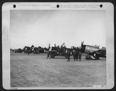 Thumbnail for Refueling > First fighter-bomber planes Republic P-47 Thunderbolts of 9th Air Force land and refuel on the emergency landing strip built in record time by 9th AF Aviation Engineers. The operation of this new developmentwas announced very recently.