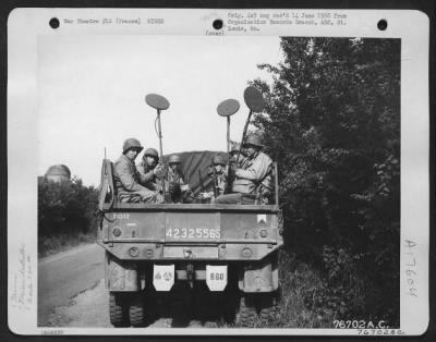 Mines > Men Of The 834Th Engineer Aviation Battalion With Mine Detectors, Stop At A Roadway Near Normandy Beach, France, Before Proceeding On To A Captured Airfield.