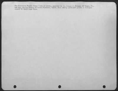 General > The Direction Finder Homer Table Is Shown, Operated By Lt. Samuel J. Freeman Of Tampa, Fla.; And Sgt. Martin Ekberg Of South Pasadena, Calif.  This Set Up Gives Lost Pilots A Straight Course To Their Home Base.