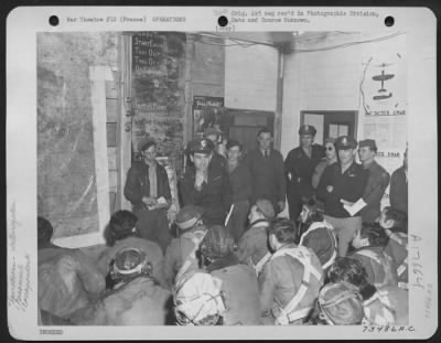 Thumbnail for General > Lowell Thomas, Nbc Radio Commentator Talking To A Group Of Crew Members After They Returned From Their Mission Of Bombing The Ordnance Depot In Nuremburg, Germany, 15 Mile Southwest Of Leipzig.  Juvencourt Airfield, France, 11 April 1945.