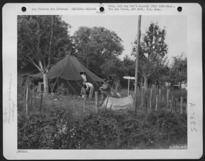 Thumbnail for General > A Gi Heads For Noonday Chow As Two Pilots Of The P-61 'Black Widow' Night Fighter Group Of The 9Th Air Force, Get Ready For 'Breakfast'.  France.  27 September 1944.