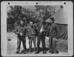 Four Members Of The Crew Of A Consolidated B-24 Who Bailed Out After Their Plane Was Hit By Ack-Ack Talk Over Their Experiences At Omaha Beach, France Before Starting Back To England For A New Plane.  They Are, Left To Right: 1St Lt. Raymond Pascual Of Is - Page 1