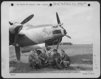 General > The Pilot And Ground Crew Of The 367Th Fighter Group Kneel Beside Their Lockheed P38 'Barb Iv' At An Air Base Somewhere In France.  7 October 1944.