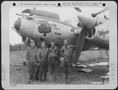 Ground > The Ground Crew Of The Lockheed P-38 'Lucky Irish' Of The 386Th Bomb Group, Poses Beside Their Plane At An Airfield In France.  30 September 1944.