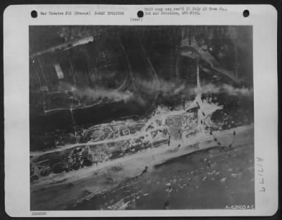 General > Men And Assault Vehicles Storm The Beaches Of Normandy As Allied Landing Craft Make A Dent In Germany'S West Wall On 6 June 44.  As Wave After Wave Of Landing Craft Unload Their Cargo, Men Move Forward And Vehicles Surge Up The Roads.  3Rd Bomb Division,