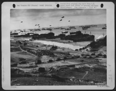 General > AS SUPPLIES POUR ASHORE for THE INVASION OF FRANCE. Photo made by a U.S. Coast Guard combat photographer from a hillside cut with the trenches of the ousted Nazi. The waters are flocked with shipping as reinforcements and supplies