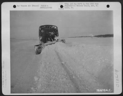 Thumbnail for Miscellaneous > Members Of The 834Th Engineer Aviation Battalion Clear An Airfield Of Snow With The Use Of A Scraper At Cormeilles, France.