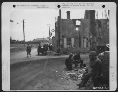 Thumbnail for Miscellaneous > Men Of The 834Th Engineer Aviation Battalion String Communication Lines In A Town Near Normandy Beach, France.