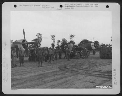 Thumbnail for Miscellaneous > Men Of The 834Th Engineer Aviation Battalion Gather Around Republic P-47S That Have Landed On The Newly Constructed Airfield At St. Pierre Du Mont, Normandy, France.