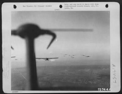 Thumbnail for General > A Pattern Of Douglas C-47S And Gliders Is Pictured Against The Sky As The 439Th Troop Carrier Group Sends Load After Load Of Airborne Infantry Reinforcements Into Needed Areas.  5 April 1945.