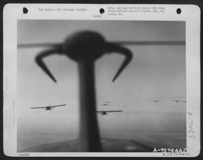 Thumbnail for General > A Pattern Of Douglas C-47S And Gliders Is Pictured Against The Sky As The 439Th Troop Carrier Group Sends Load After Load Of Airborne Infantry Reinforcements Into Needed Areas.  5 April 1945.