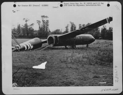 Thumbnail for General > An American Glider [Airspeed Horsa] Lies Dismantled In A French Field After It Has Successfully Completed Its Mission Of Landing Its Load Of Men And Materiel Safely.  Note The Tracks Leading From The Body Of The Glider, Used To Unload A Vehicle.  Northern